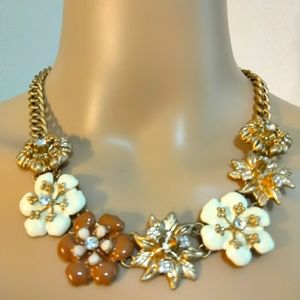 Necklace Brown,white and gold toned piece.